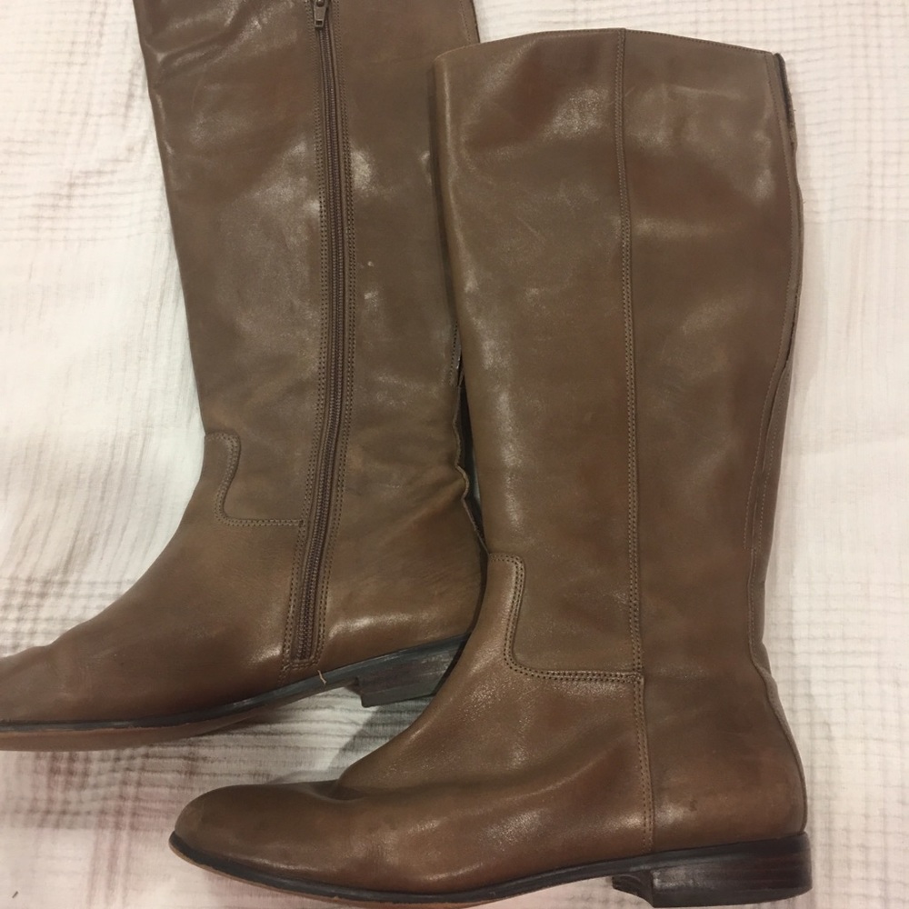 Tan knee-high boots. 8.5